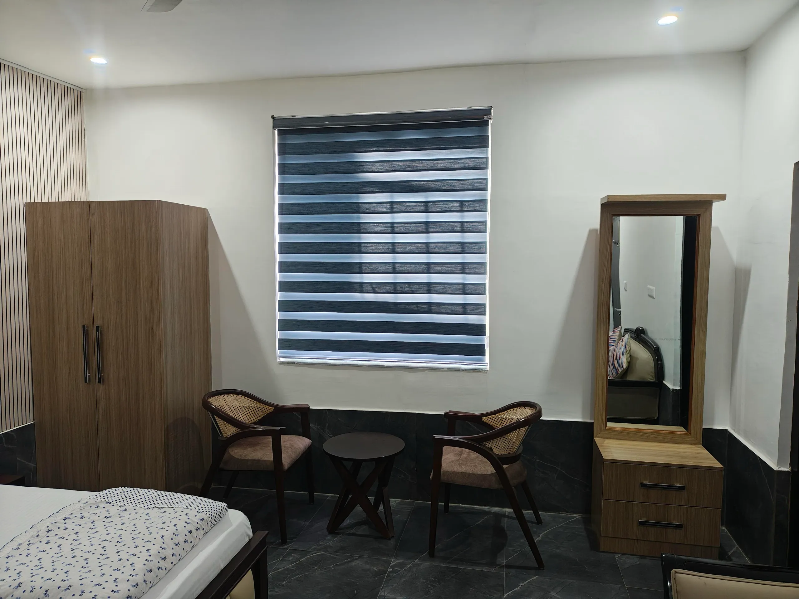Bedroom with wardrobe and dressing mirror