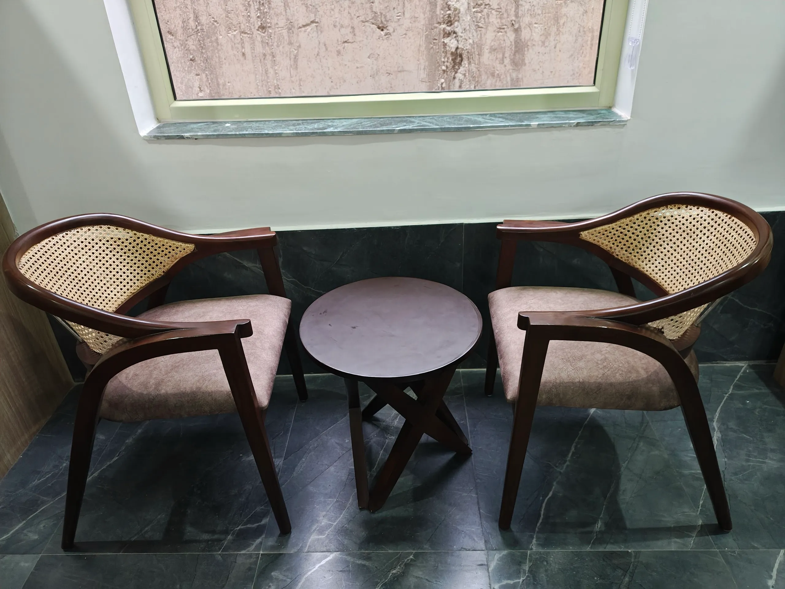 Pair of cane chairs in sitting nook